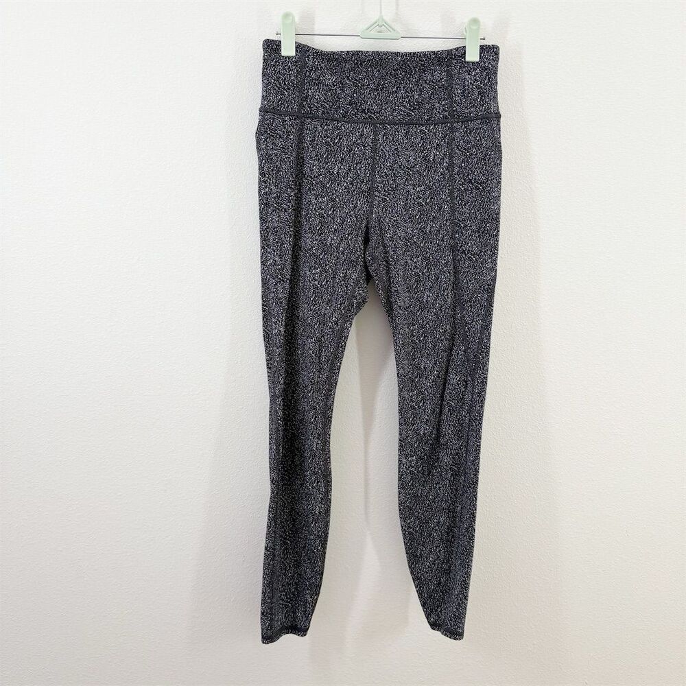 Athleta‎ Salutation Stash Pocket Rainwater Leggings Size M Black White High Rise